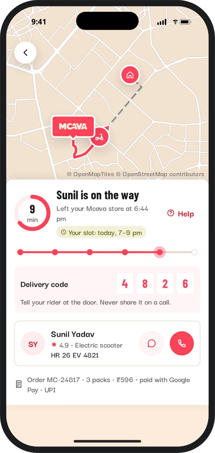 The app’s tracking screen: the rider is on the way, with live progress and a 4-digit delivery code.